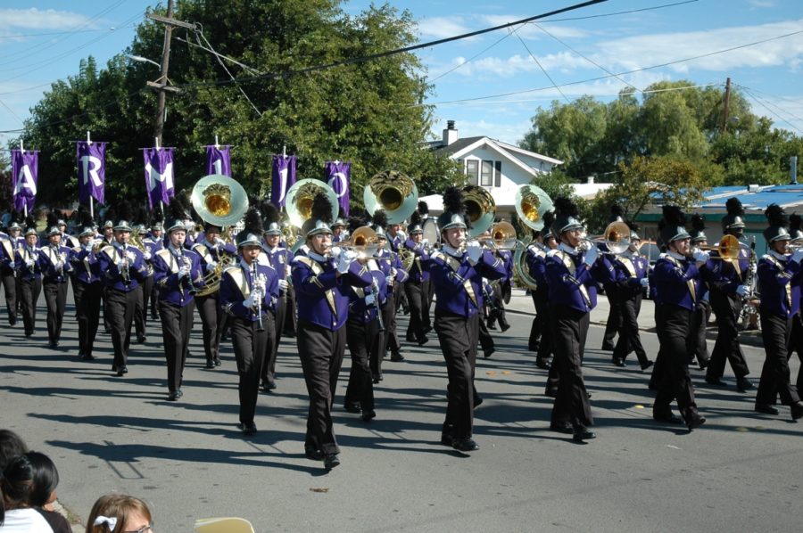 A recent picture of the Armijo Marching Band performing at a local parade.