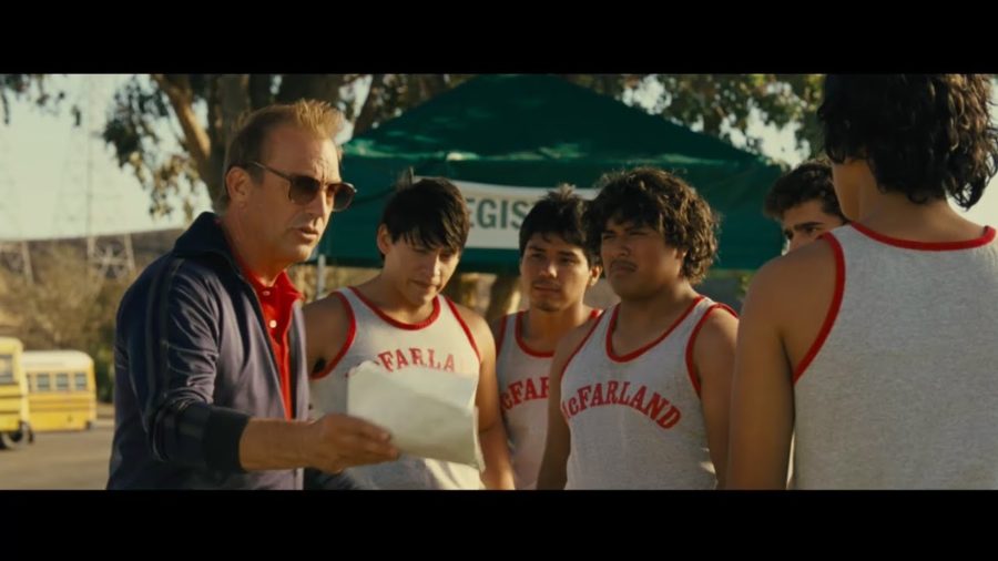 Coach White (Kevin Costner) gives advice to his athletes in McFarland USA.