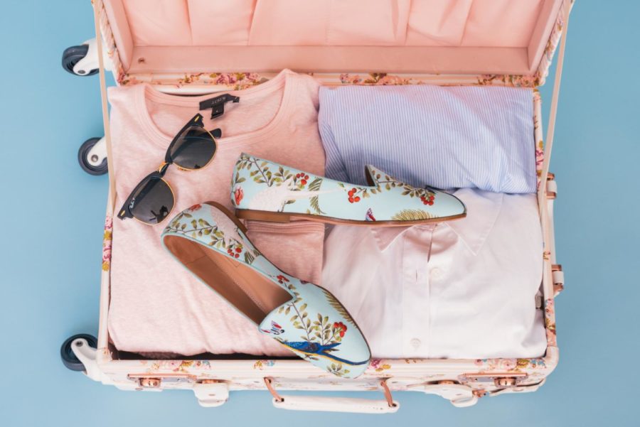 A cute outfit packed in a suitcase 