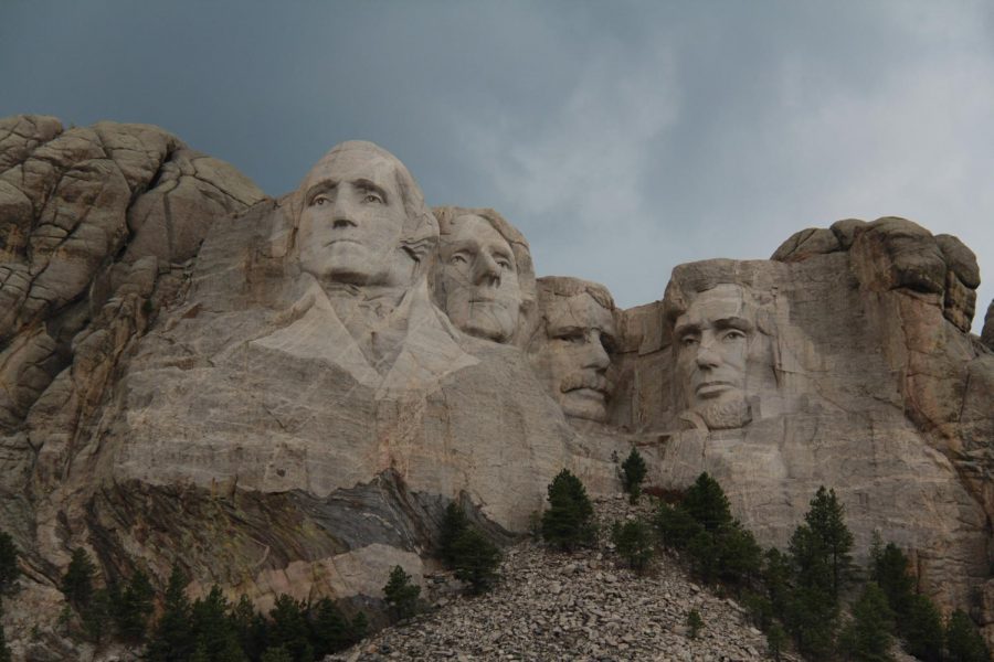 Mount Rushmore honoring four of the forty-five.