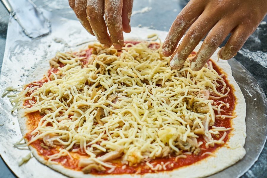 Cheese pizza can be a meal or a foundation for a variety of toppings.