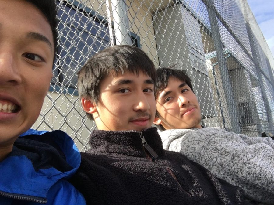 Michael (far left) hangs out with his friends Jerry Nguyen and Jeffery Nguyen.