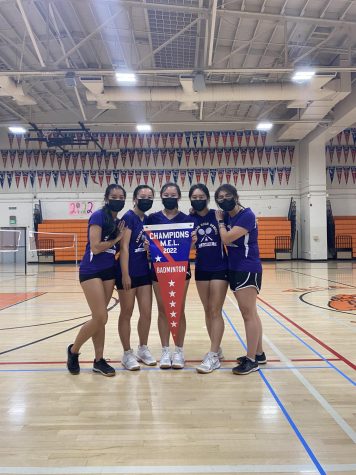 Team captains proudly share banner for 2022 MEL Championship.