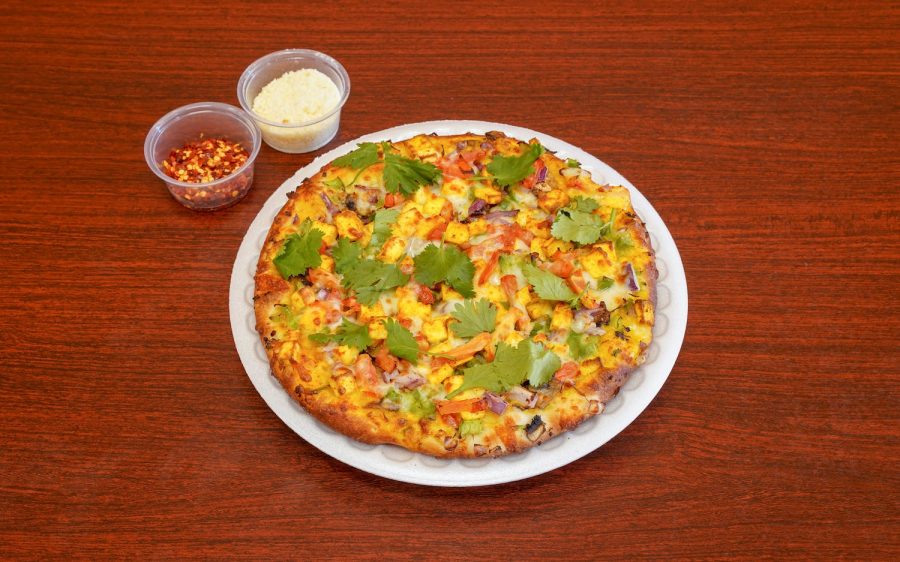Youll only find a Curry Paneer Pizza at an Indian restaurant.