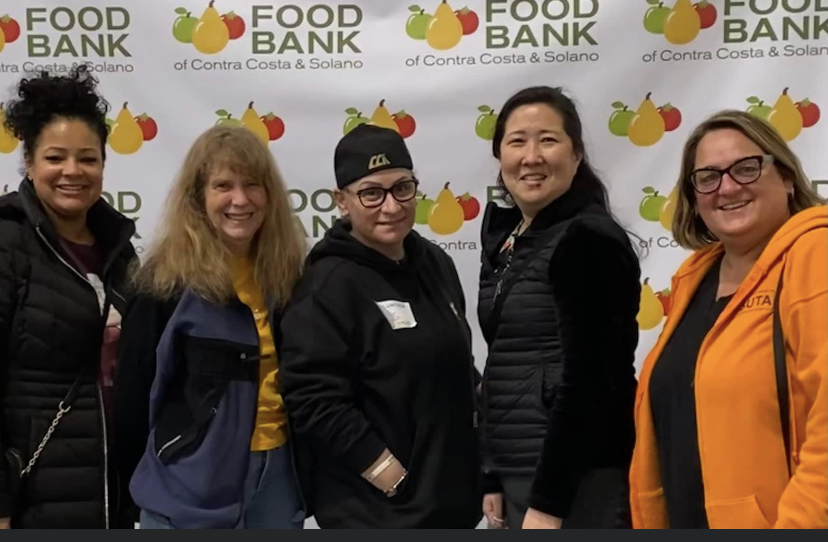 Ms. Ryenne Bonnett, Ms. Lynne Herring, Ms. Zarena Brown, Ms. Susanne Watson and Ms. Vanessa Walling-Sisi are all smiles after bagging oranges and prepping supplies for hours.