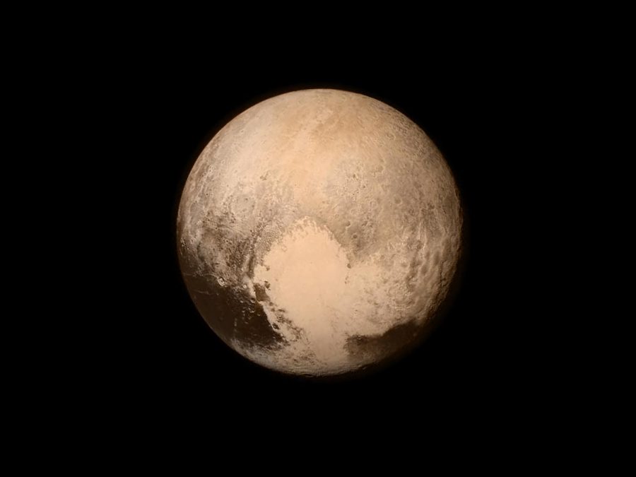 Pluto is still a planet, but it is scientifically identified as a dwarf planet.