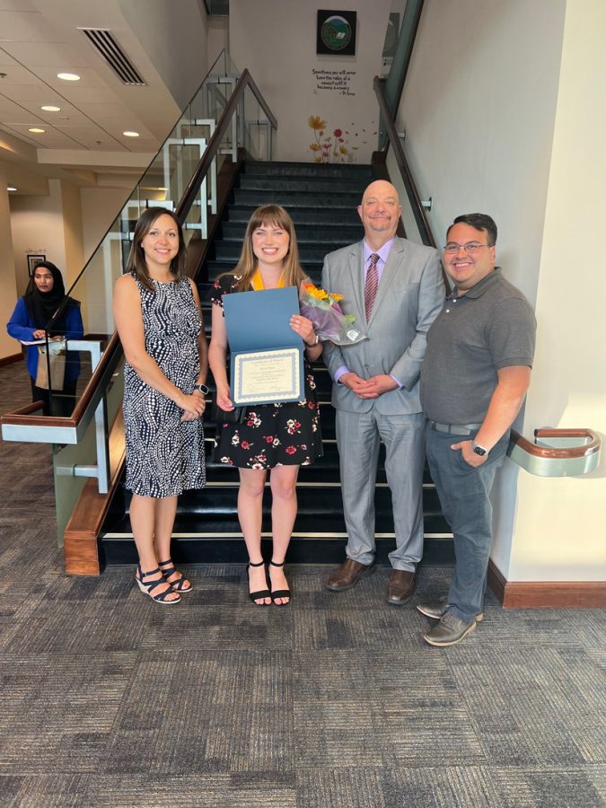 Olivia proudly displays her special honor after the May FSUSD Board meeting. (Also pictured: VP Tessa Pryor, Principal John McMorris, and VP Chris Hill.)