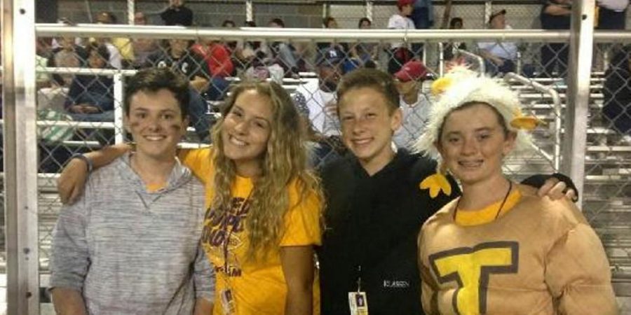 From left to right,  Alexander Padgett, Kennedy Corley, Nathan Klassen and Jack Curry show they have a lot of school spirit.