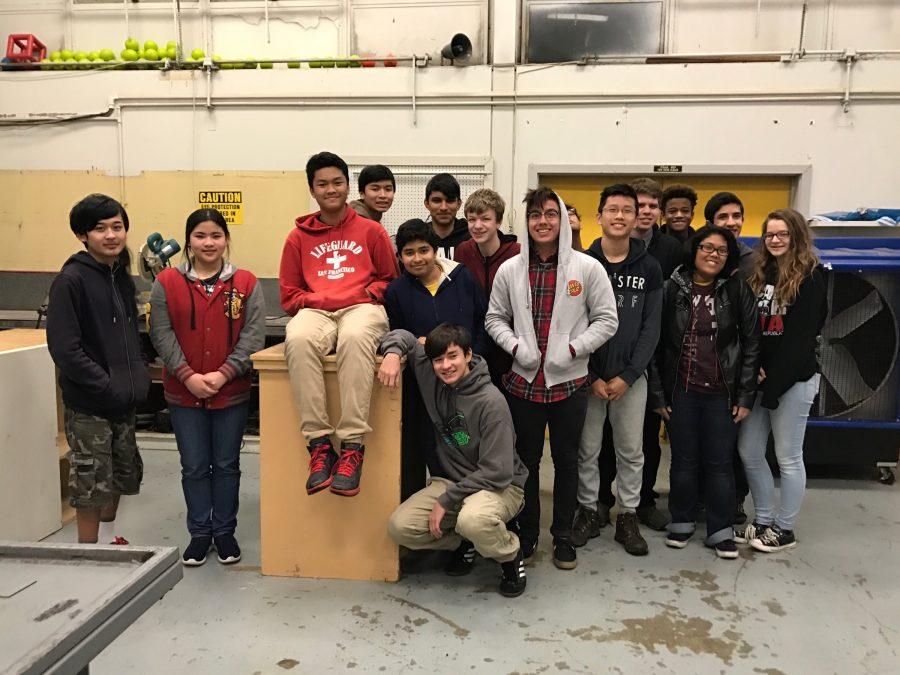 "Say Robotics!" Robotics members pose for a group photo during a work day.