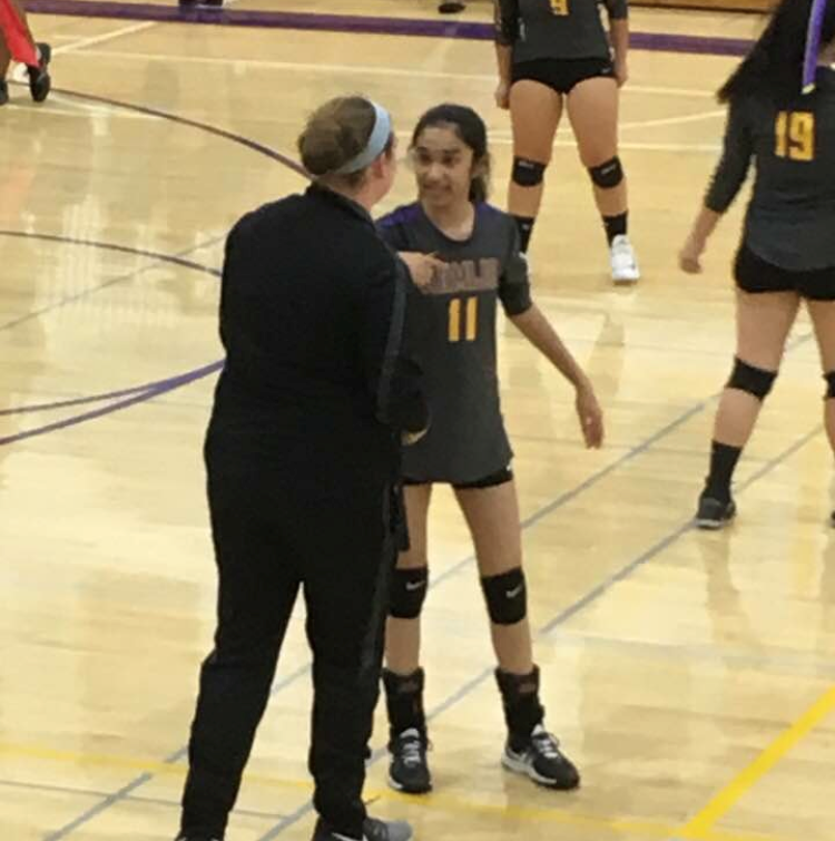 Coach McConlogue offers sage advice to Diya Patel.