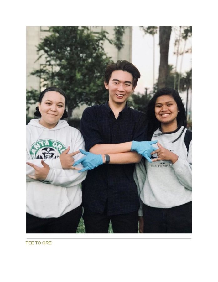 Royce (center), pictured with with Key Club members working at Produce Pipeline at the Fairfield Farmers Market.