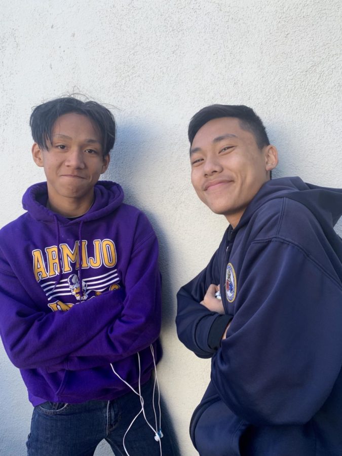 Maico (left) mugs for the camera with his friend Benjamin Her