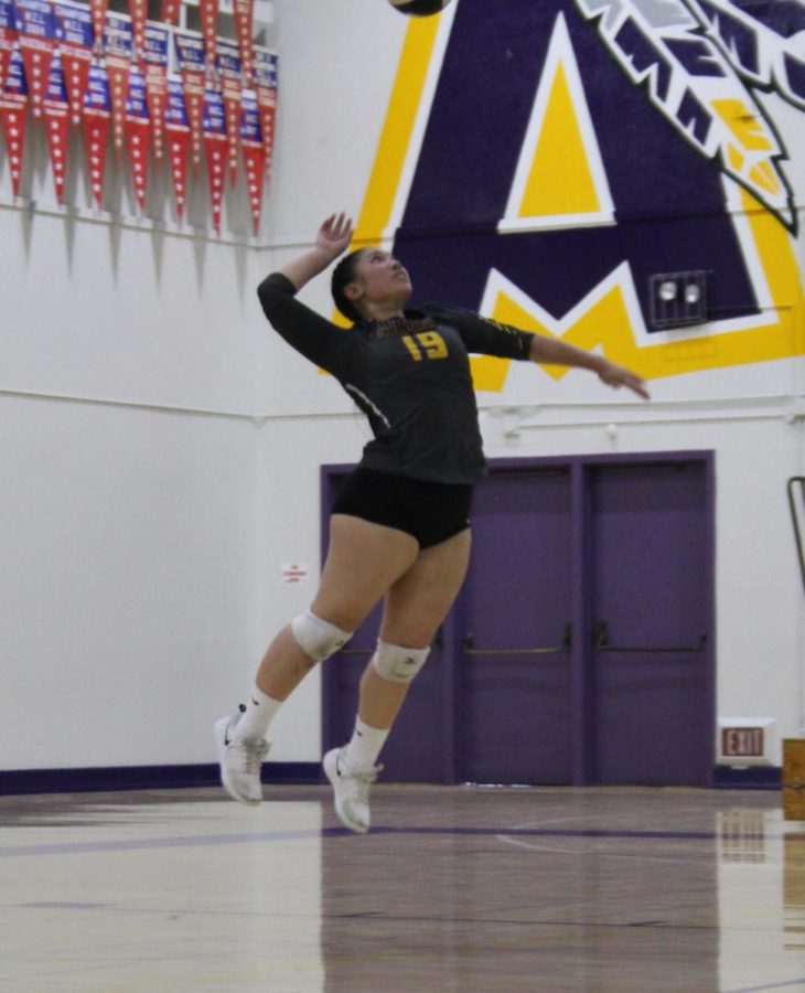 Khalia reaches for the sky whenever she plays volleyball.