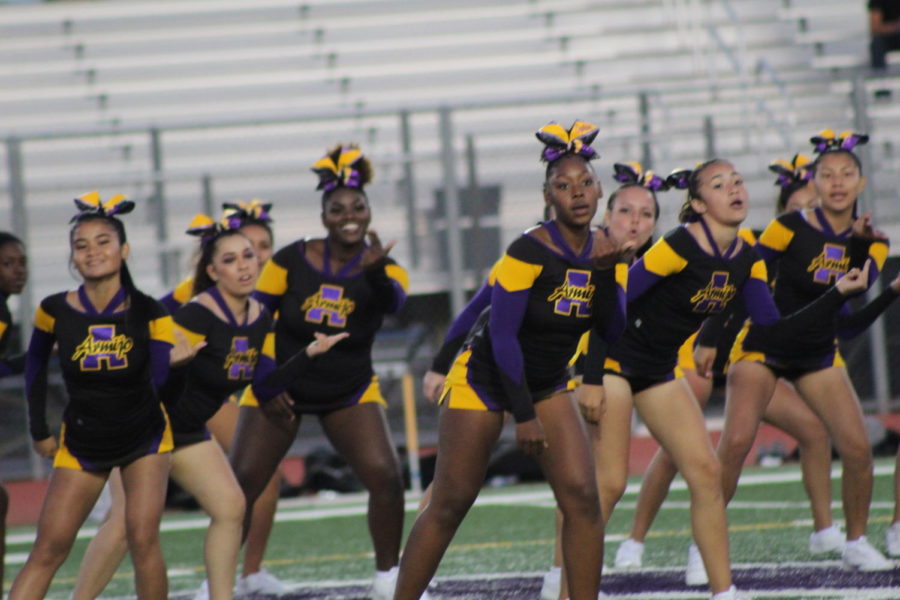 Cheerleaders give it their all at every game to keep the fans hyped.