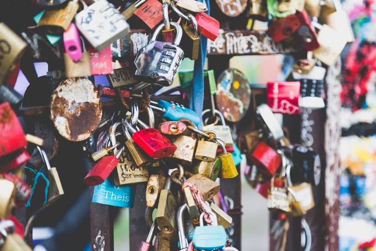 Padlocks on the docks signaling commitment, not being chained down.