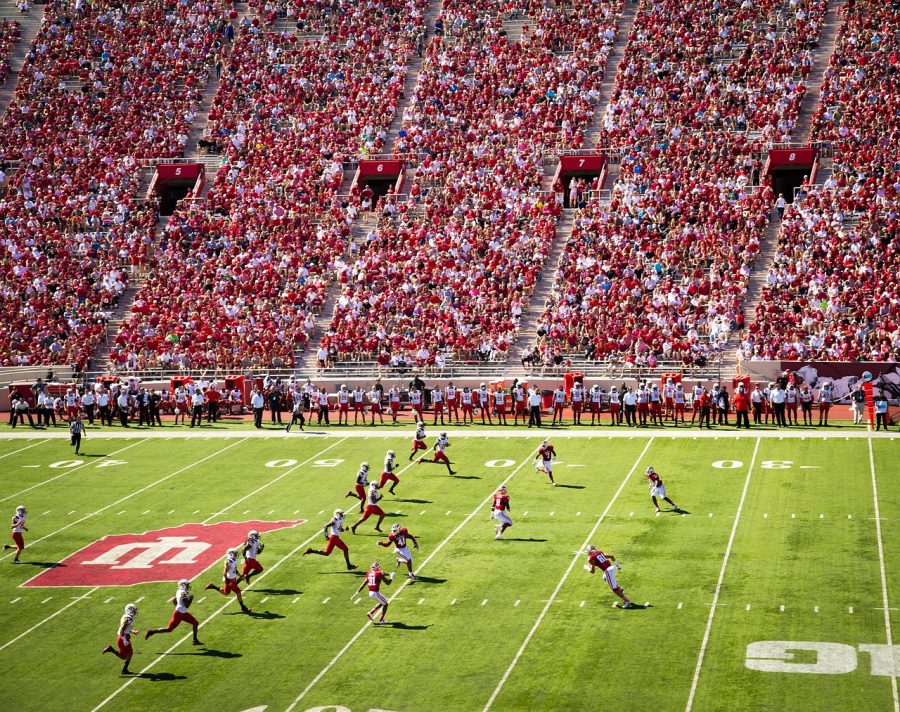 A sea of team colors shows a strong fan base for college sports.