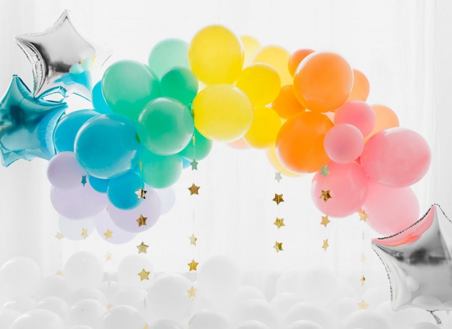 Everyone is happier when they get a bunch of balloons.