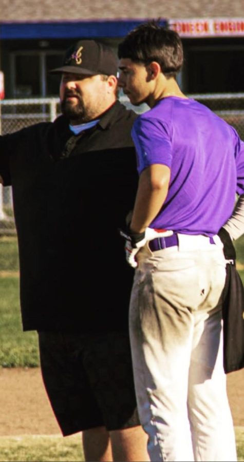 Coach Towner (left) gives advice to Dom Becerra, from PSA, who plays for Armijo.