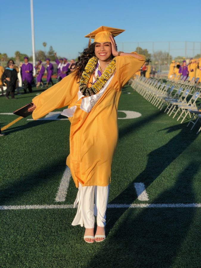 Neither wind nor weather can keep graduation from happening.