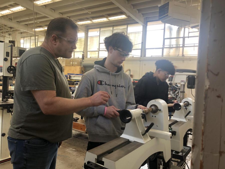 Mr. Davis assists a student in an individual project.