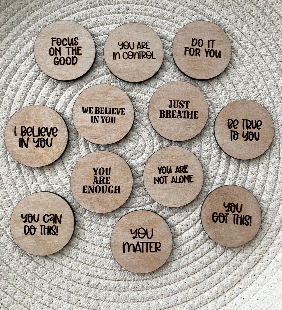 Little wooden signs spreading positivity for those who need it.
